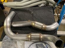 Headers arrived after 13 weeks. Jet Hot 2000 off-road gray coated Stainless Works 1-7/8 x3" headers with GESI converters and x pipe.