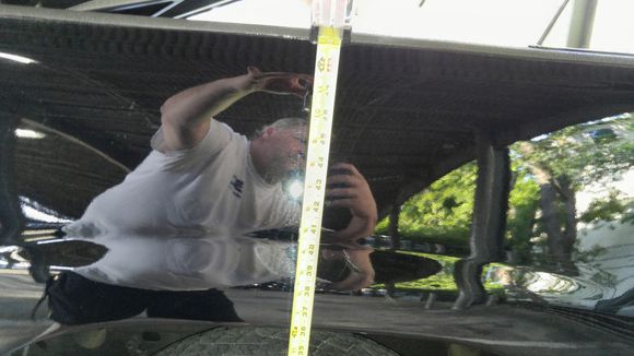 I measured the distance from the ground to the top of the truck's bed.