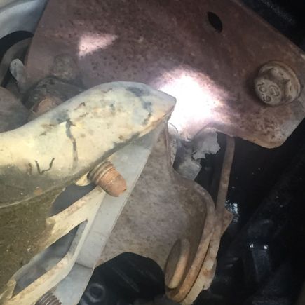 .....bad engine mount...... And engine mounts are next couldnt get a good pic of passenger side but this is the driver side....