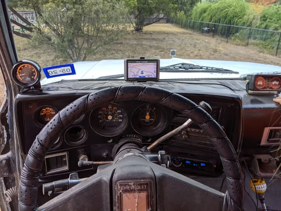 My command center. Needle on the speedo is broke and the gearing on the cable is wrong so the Garmin functions as my speedo as well as it has the trails marked at the off road park. I was able to hack it and get the latest updates from July 2019 on it. 
