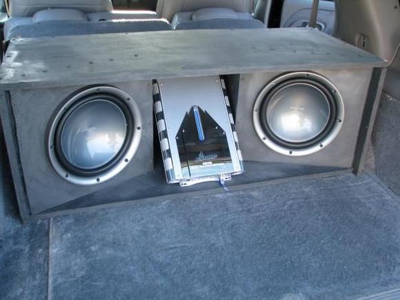 Sub box in back, Amp has been replaced with Crunch 2500 watt. That Lanzar that is in the box in this picture just couldn't hang.