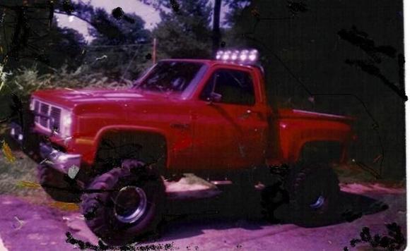 JD My 1985 GMC sierra Stepside  350v8 Granny low 4 speed, Double tube roll bar 5 KC daylighters, brush guard, 40's 16&quot; total lift. This was one mean truck