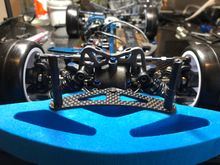 Shock tower material removed to allow for newer bodies to be mounted.
