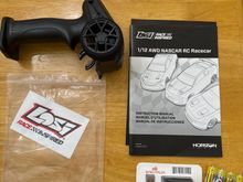 Remote, charger, AA’s, manual and decal
