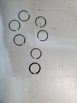 You can see the size difference in the wire diameter of the spring clips. Upper original, lower the replacement