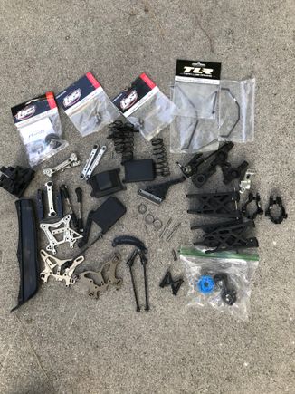 New front rear shock towers,new case, couch bell in bags 13-14 tooth And flywheel, trade for Tlr Truggy? 