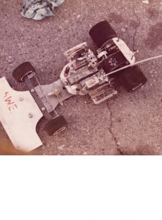 My RC100 in 1975.  This was a conversion kit from an RC1J and before they had the one piece aluminum front end.  The radio tray had to be cut out per a template.  The engine is a Veco .19 that Thorp had tuned for me.