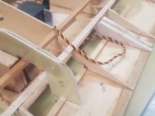 Servo attach point installed on left wing, notice different location than the right wing. 