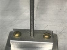 The machined base, screwed to bottom plate.
