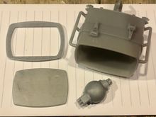 Basic spotlight kit is simply these four parts. It is a "static" kit and does not come with anything to make it "lights up". With some modification by the end user it can be made to accept an LED and wiring. 

The one shown on my M60 above has a mirrored plastic refractor which I cut out and made to fit in place of the supplied flat part (bottom left in photo) intended to be painted silver and used as the refractor/lens cut out template. 