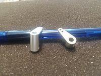 CNC made of aircraft grade aluminum that requires no drilling.  These arms just slid on the brass shafts and you just tighten the Allen screw with thread lock!