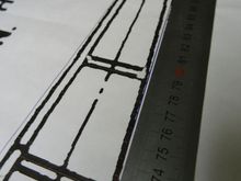 The plan is distorted. The blue Biro line to the right of the starboard longeron and to the left of the port longeron illustrate the true line. Likewise the one-metre rule.