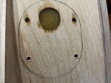 Removed masking tape and drilled out the holes.