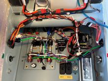 I mounted two super bright LEDs on the struts.  They require a 1S lipo to operate. That's the batt you see lower right on the equipment tray.  Behind the batt is the servo operated switch to the lights turn on and off.  Once I see the locks are engaged I will turn them off to save the batt for lots of flights.  I found I'd get about 30 minutes of lighting with them on steady so I'll have plenty of capacity even if I leave them on a lot.