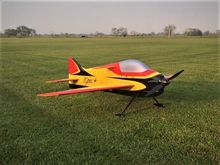 Well manicured grass runway with open overfly area