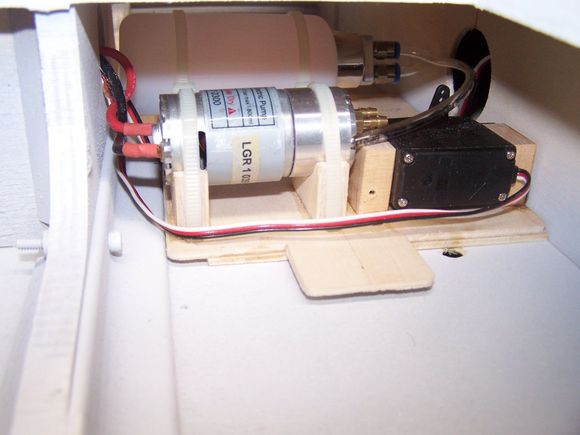 The tray sitting where it will be installed. I won't use the pocket and screw to hold it. It will be held in with two screws.