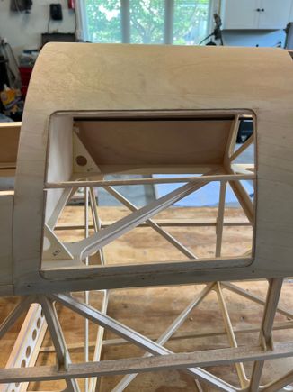 I installed a .8mm flange all around the inside and a 1/4 balsa flag on the bottom to screw into. I have since trimmed away most of what the screws didn't screw into.