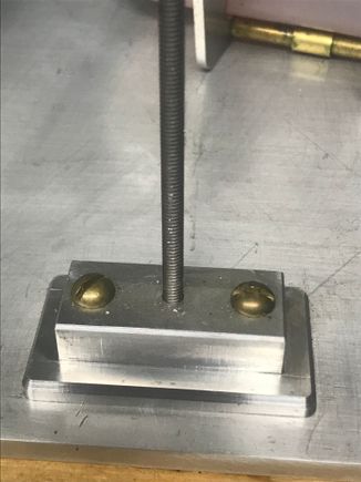 The machined base, screwed to bottom plate.