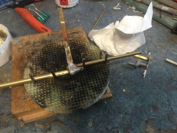 Brass tube and a strip bent over them for the idler 