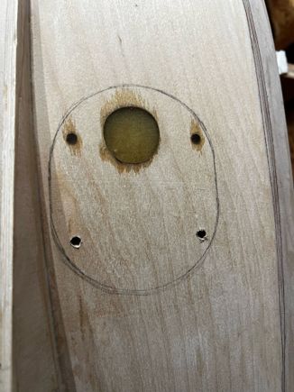 Removed masking tape and drilled out the holes.