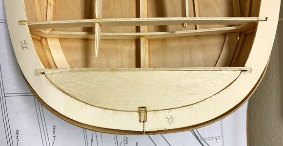 Cut pieces to fill in the stern area flat.