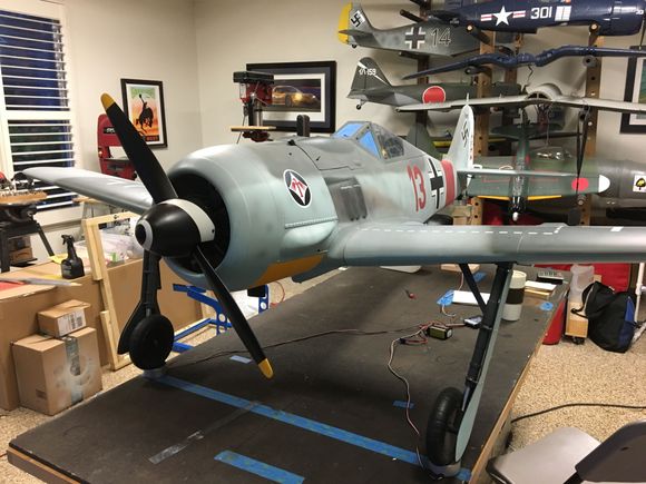 Hope this helps. Spektrum DX 18 transmitter. Spectrum 12 Channel Power Safe Rec. Two 3000 Mah Spectrum Life Batteries for receiver. Cortex Gyro Powered through the receiver . Ignition battery eliminator, so no separate battery needed for the ignition.No big deal to have another battery for the ignition. Engine Saito 90RG, Keep your weight forward, you will need to add weight to balance in the cowl, Mine weighs about 32 lbs. I use a 3 blade Biela Folk Wuff prop (not shown here from Aircraft Inter