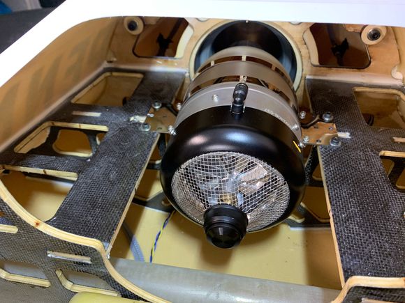 Turbine mounted with 4 blind nuts/bolts.  I'm not a fan of blind nuts but in this case they were the best option.