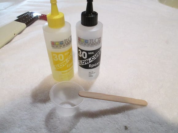 I prefer to use 30 minute epoxy to glue the hinges in place.  Some builders prefer other glues such as Loctite Hysol or even Gorilla glue just to name a few.  I'm careful to mix the correct amounts of Epoxy to Hardener and to mix thoroughly.