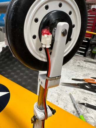 Installing scale like band clamps to hold the brake wiring