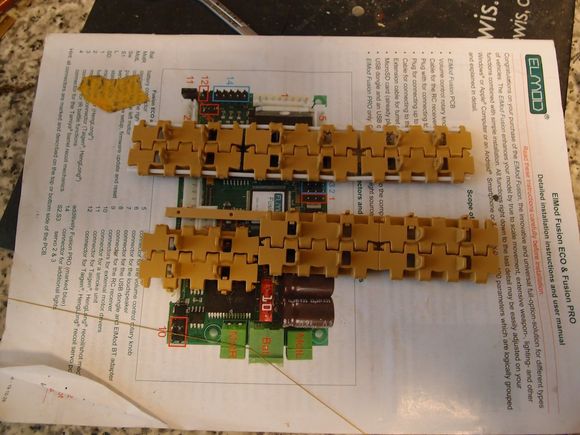 The jig for the track hangers compared to the Tamiya setup.