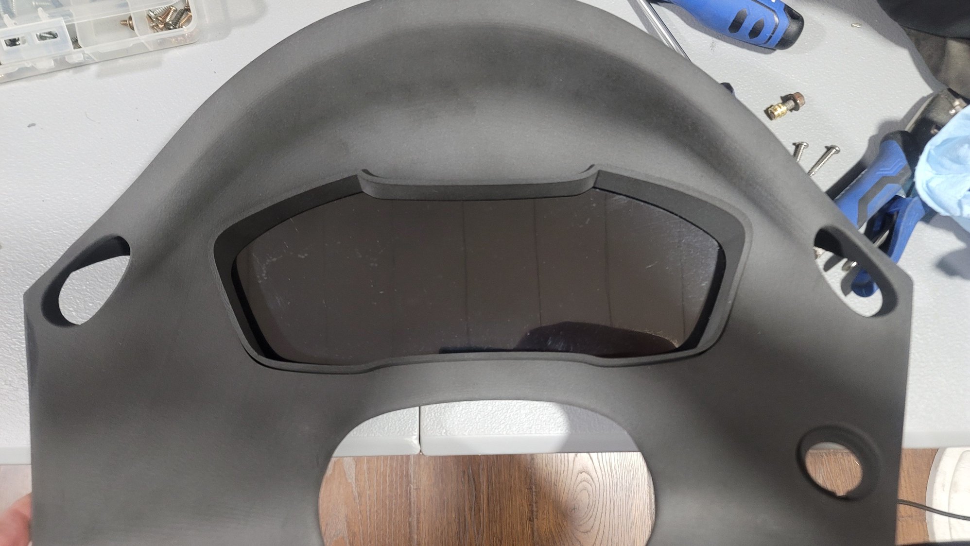 The screen still has the protective sheet on it, so it'll look better.  I also might use the other screen still too.  I'll either use filler and sand it, or just try sanding the nylon directly.  It was SLS printed and shot peened after to try to remove some of the lines.  There aren't too many lines anyway, but it still needs some finishing.  I bought some SEM Landau Black from Amazon to finish it.  I have some threaded heatserts to install too.