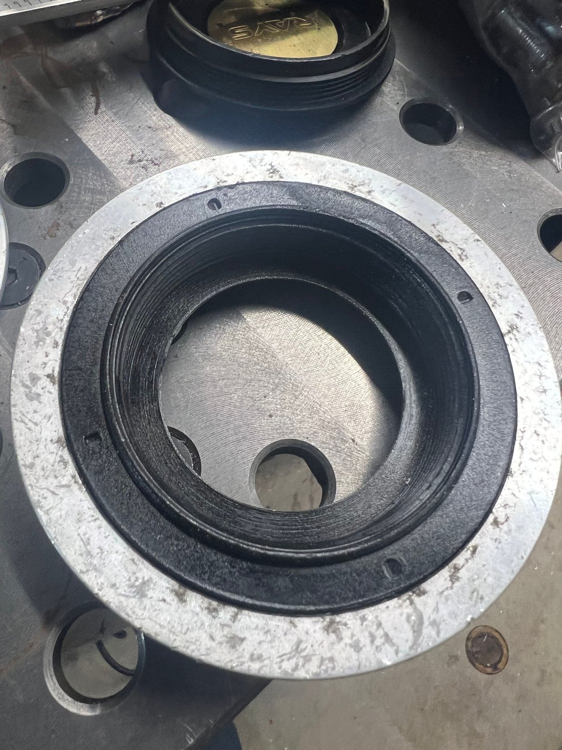 The molded in plastic threads. Impossible to remove without destroying the.  They are molded on both sides of a flange in the nut. And they melt really easy (I thought maybe they were glued and tried some heat, didn�t go well. 