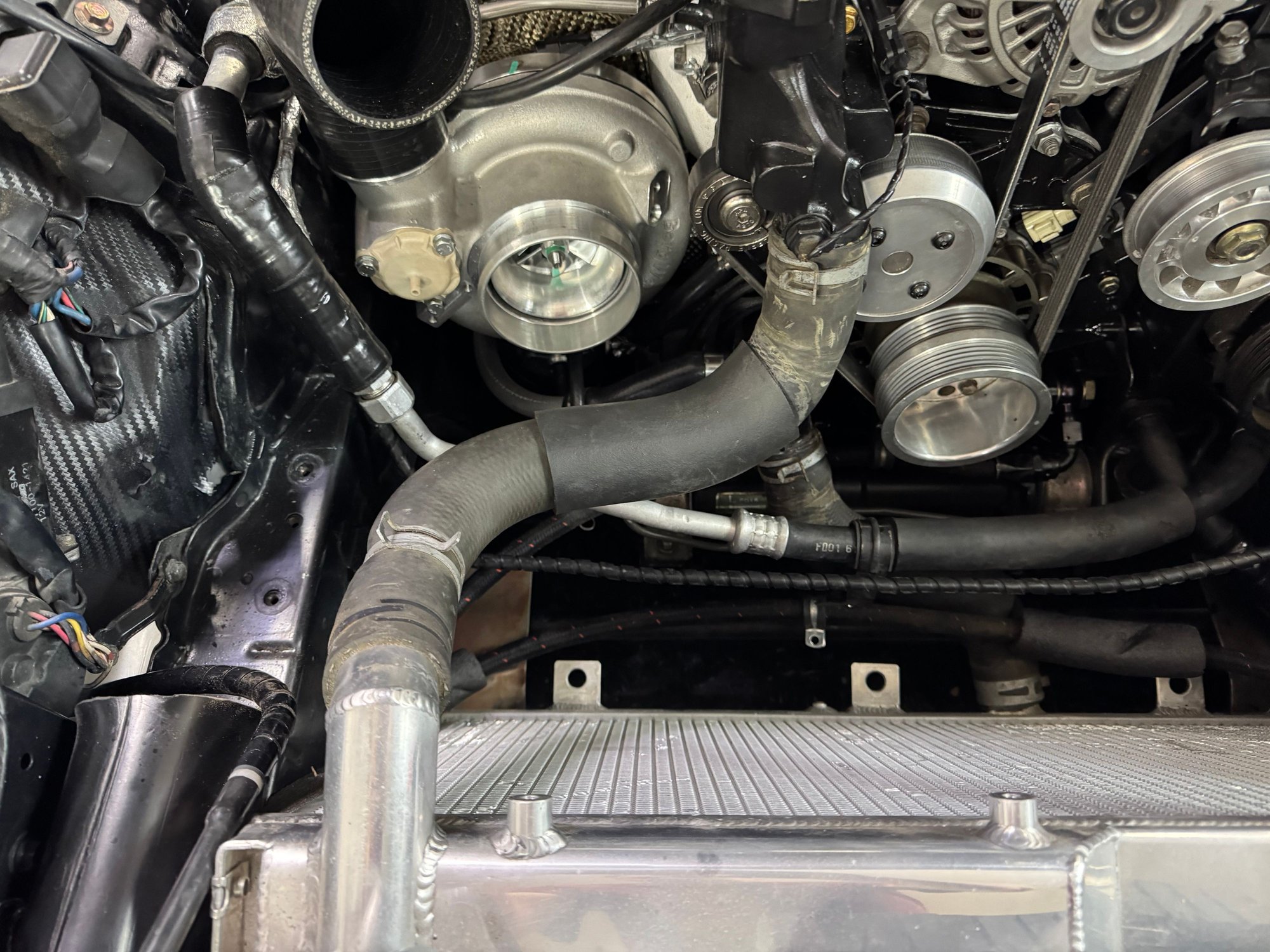 Existing radiator hose.  Very hard to get a picture of the interference issue but it was in the way.