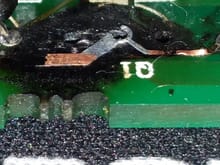 In depth view of solder run damage.  Note the missing run at the top center.