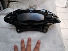 2014 mustang brembo brake, 6in center to center mounting holes, basically a Evo 10 (evo X ) brake caliper but not sure if its identical. 