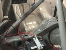 200A motorcycle battery. You can make out the upper support for the 4-link rear arms. 