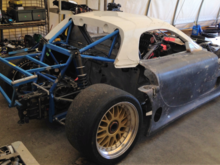 Once the car was back home we stripped it and will repaint the front and rear chassis a  period correct factory mazda blue