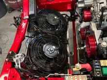 Radiator fans were replaced with new dual flex-a-lite s-type fans. New mishimoto radiator  with all new coolant lines throughout the engine bay. 