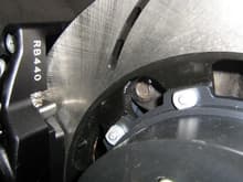 Racing Brake front closeup, notice the alternating mounting tabs (front/back)