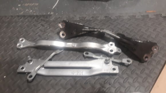 It was raining most of the day so i got crazy and cleaned these parts. The black looking one is the way they all looked. I cleaned that one as well and the results were great. I also cleaned all the botls and nuts that belonged on the rear suspension. 