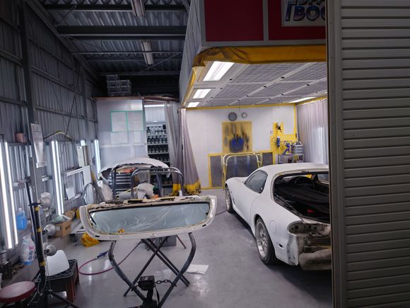 A friend's car at the same shop getting a full respray in the newer Mazda Snowflake White pearl