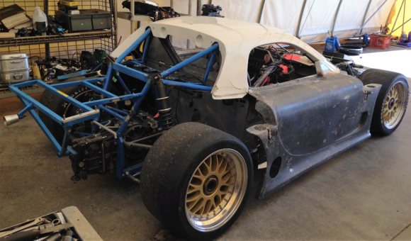 Once the car was back home we stripped it and will repaint the front and rear chassis a  period correct factory mazda blue