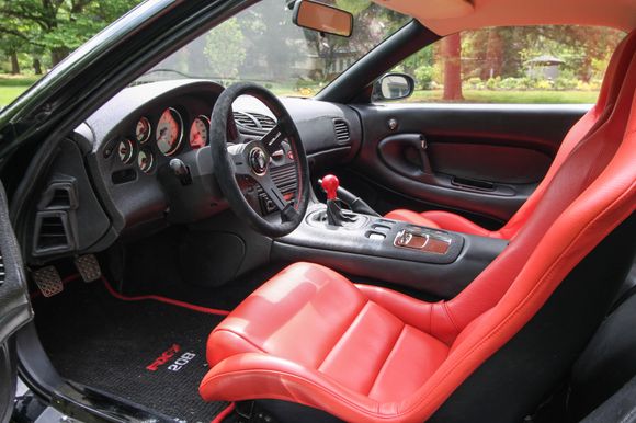In both this picture and the next I think you can see what I mean about the black backs making the seats appear "thinner".  The backs just disappear into the black of the interior.