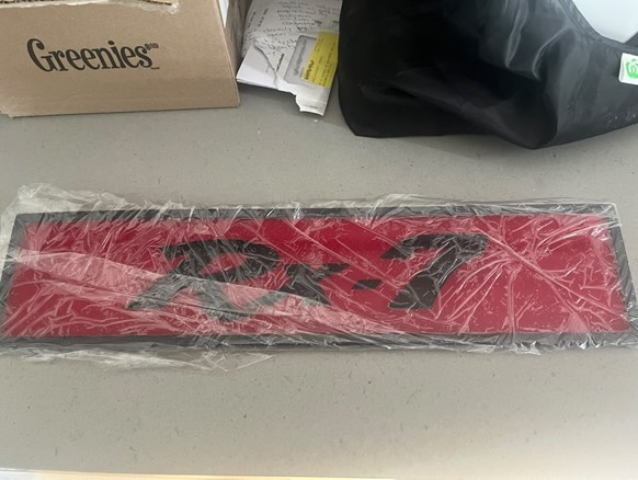 This was found in a warehouse in Boulder, Colarado nearly 20 years ago.  It is one of my favourite Mazda items.  The Allan Moffat Series 1 specials had a larger filler panel.  This is for a Series 2 which fits my 1980 RX7.