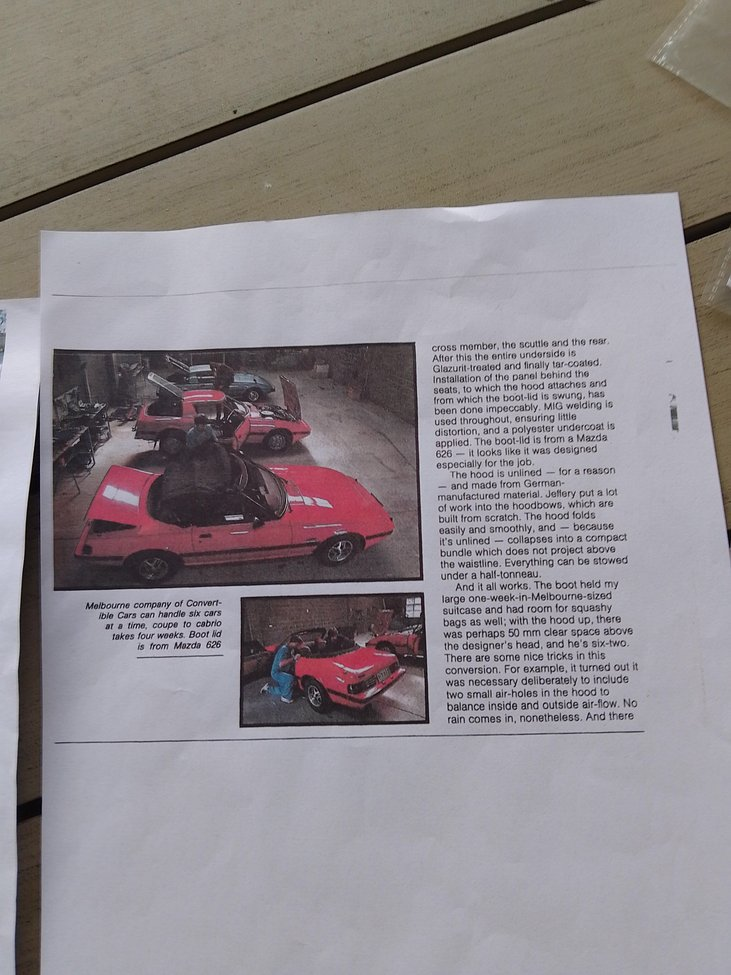 This is a photo of the Convertible Cars Australia workshop with Series 2 or SA cars under conversion.  The car at the rear is almost certainly a Japanese import vehicle.