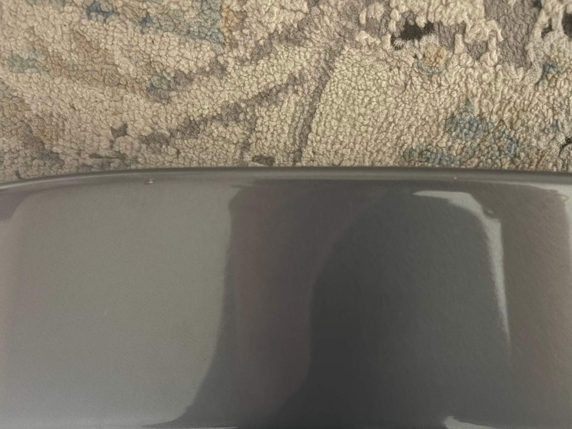 2 small imperfections on top edge 