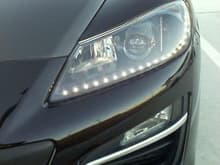 Painted head light with LED strip inside