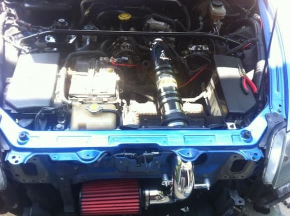 mmmm shiny, I really want a greddy strut bar with the blue legs and polished bar to match paint and intake
