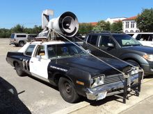 "It's got a cop motor, a 440 cubic inch plant, it's got cop tires, cop suspensions, cop shocks. It's a model made before catalytic converters so it'll run good on regular gas. What do you say, is it the new Bluesmobile or what?"