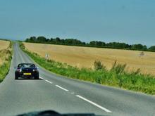 The open road in the English countryside on a perfect summer&#39;s day